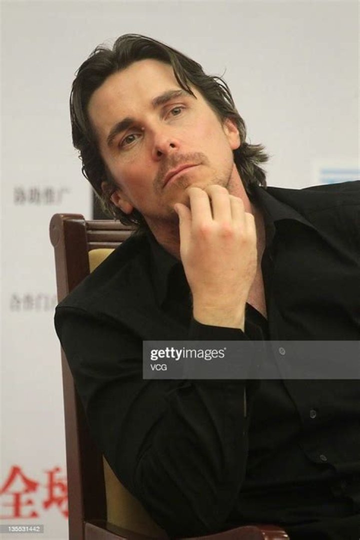 Actor Christian Bale attends a photocall for the movie "Batman