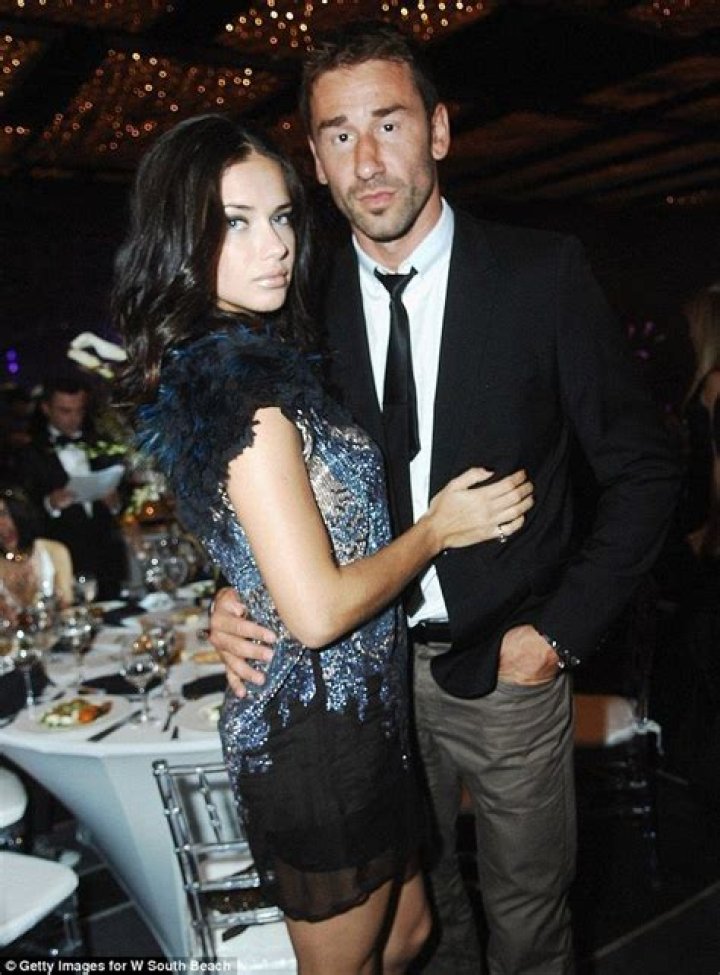 Adriana Lima holds hands with boyfriend Joe as they pop out on coffee