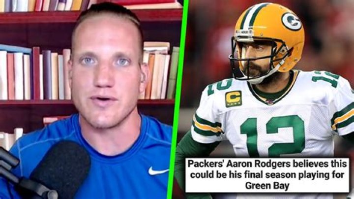 AJ Hawk and Aaron Rodgers with a Marine who surprised his family before