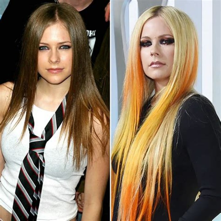 Avril Lavigne Exposed Boobs In Leather Corset And Pants (7 Photos) 
