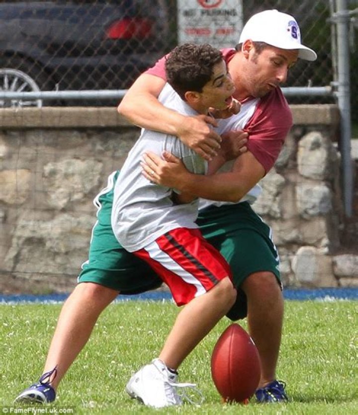 Cameron Boyce Playing Football