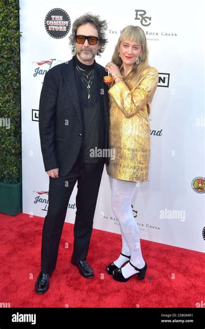 Camille Johnson and Chris Robinson attend the 2023 CMT Music Awards