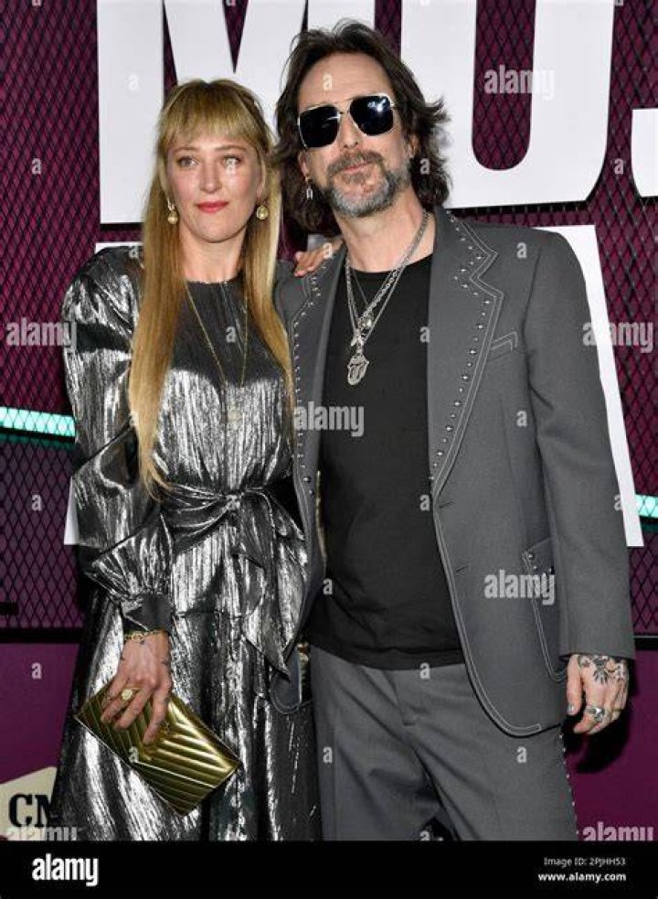 Chris Robinson, right, and Camille Johnson arrive at the CMT Music