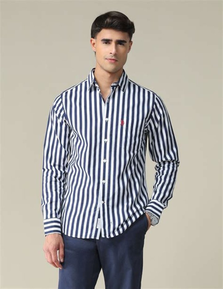Classic Man in Striped Shirt and Tie Michael Kitchen