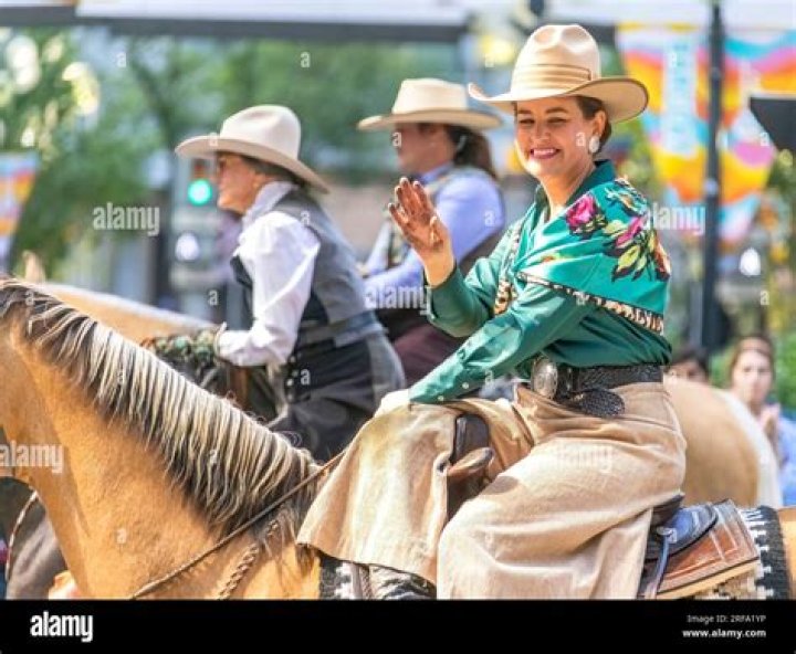 Cowgirl Riding a Horse at a Rodeo