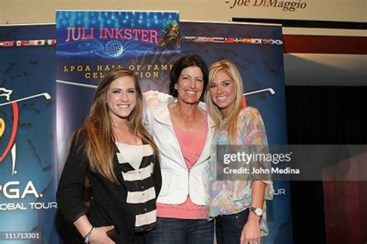 Daughters Cori Inkster and Hayley Inkster pose for a photo with mom