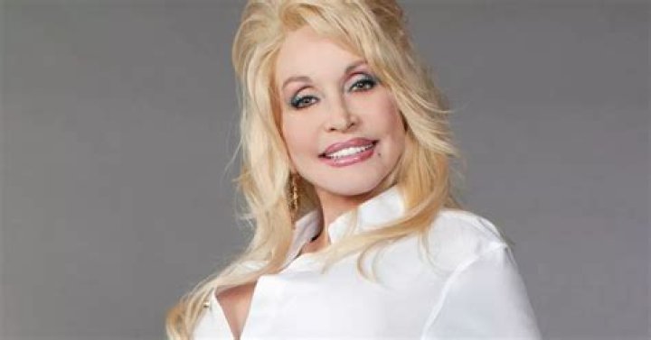 Dolly Parton admits 40DD boobs are too big but cheekily 'wants you to