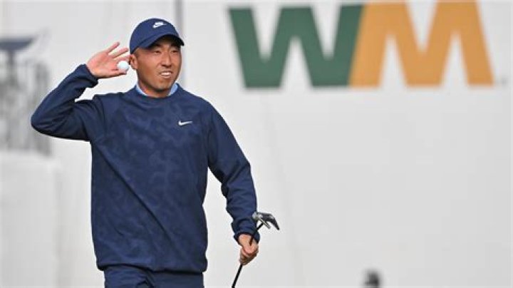 Doug Ghim's caddie Jeff Ghim on No. 2 during the second round of the