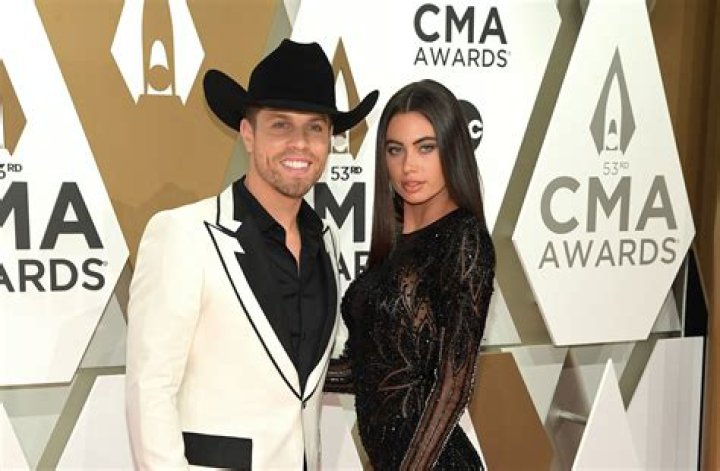 Dustin Lynch & Kelli Seymour from 2019 CMA Awards Red Carpet Couples