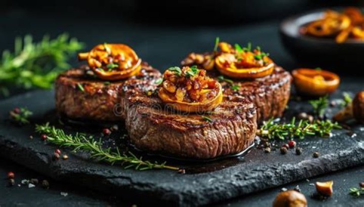 Gourmet thick juicy fillet steak medallions grilled to perfection and
