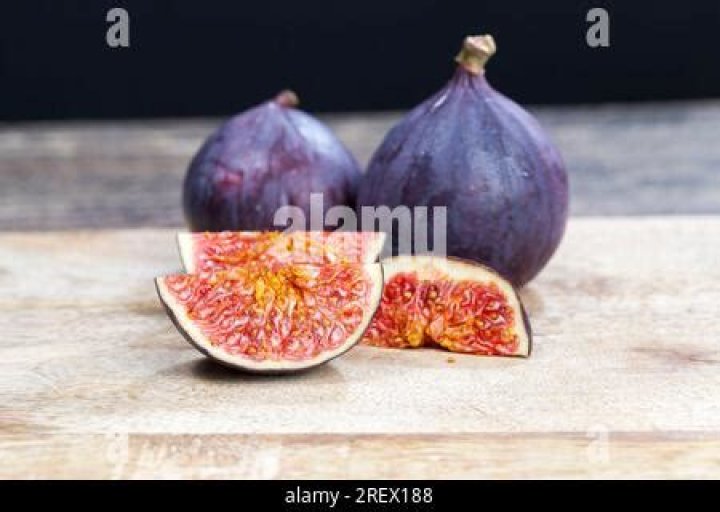 healthy red delicious fig pulp with seeds, ripe figs 9451147 Stock