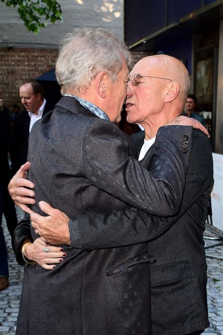 Ian McKellen and Patrick Stewart share a kiss at Mr Holmes premiere