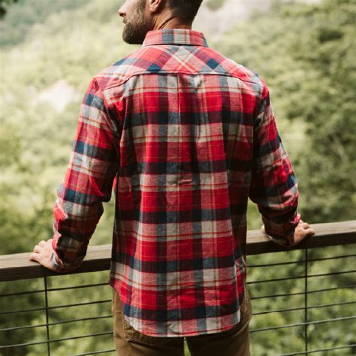 Jackson sports flannel top and jeans for lowkey Mother's Day