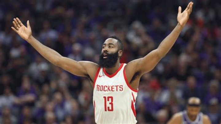 James Harden (C), winner of the 20172018 MVP award, poses with his mom