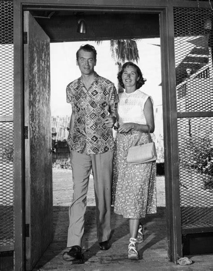 James Stewart and Gloria Hatrick McLean at a party Photo Print (10 x 8