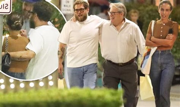 Jonah Hill appears to be in a jolly mood as he puts his arm around his