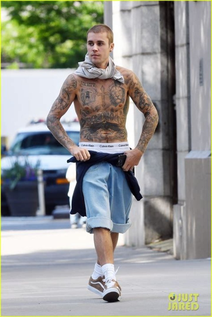 Justin Bieber shows off his various inks Irish Mirror Online