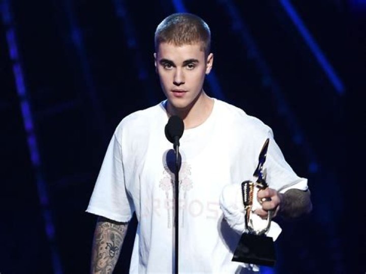 Justin Bieber warned by Canadian authorities after posing with lion