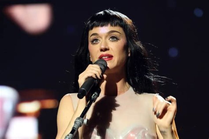 Katy Perry breaks down in tears and shouts that the US has 'failed us