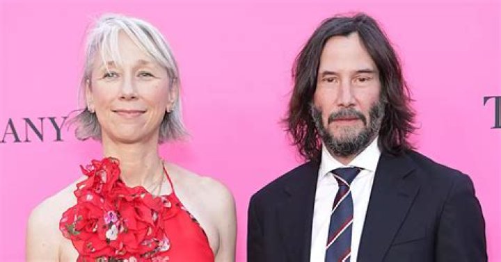 Keanu Reeves Shares A Kiss With Alexandra Grant On Red Carpet