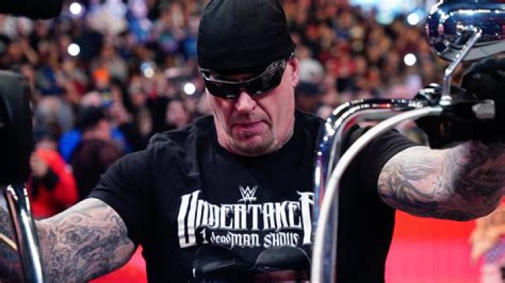 Legendary Wrestler The Undertaker Scares Off Shark at Beach, Impresses