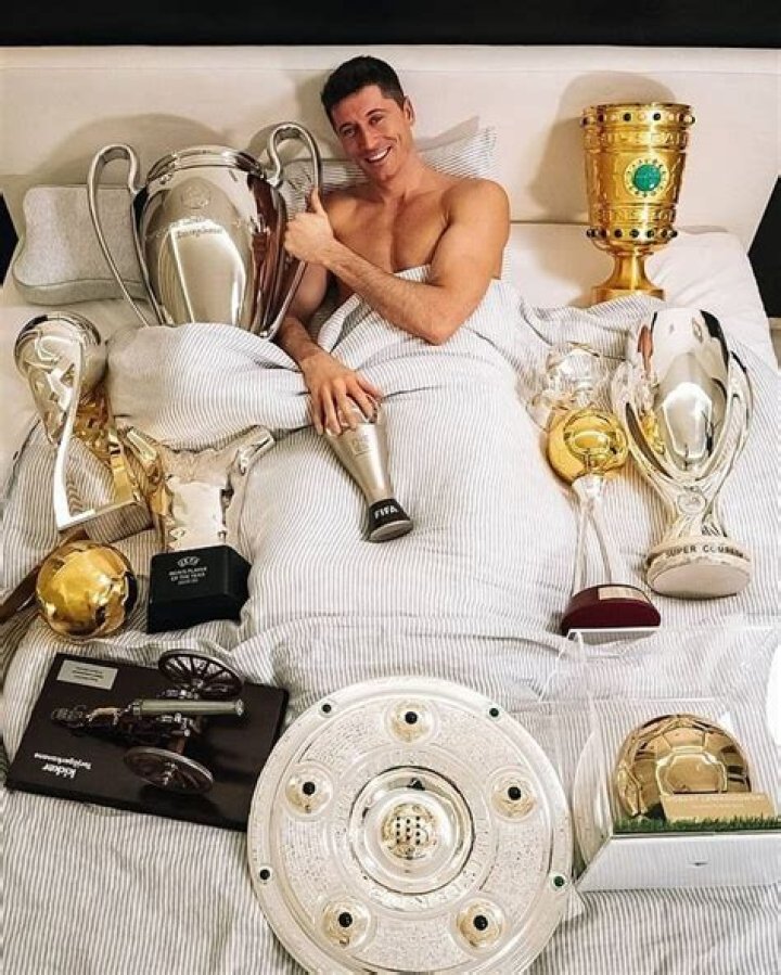 Lewandowski celebrates his remarkable 2020 by posing the trophies he's