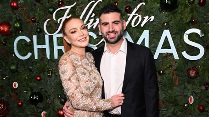 Lindsay Lohan cuddles husband Bader Shammas in rare lovedup photo