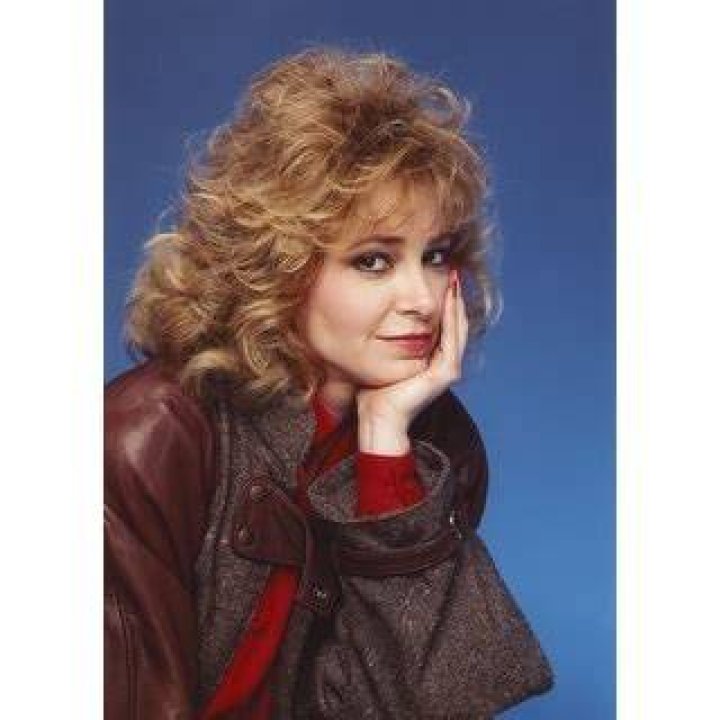 Lisa Eilbacher in Leather Coat Blue Background Portrait Photo Print (8