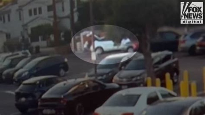 Los Angeles surveillance video captures man dropping large object in