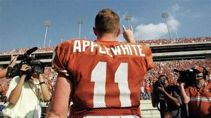 Major Applewhite (11) and Chris Simms (8) share a laugh on the
