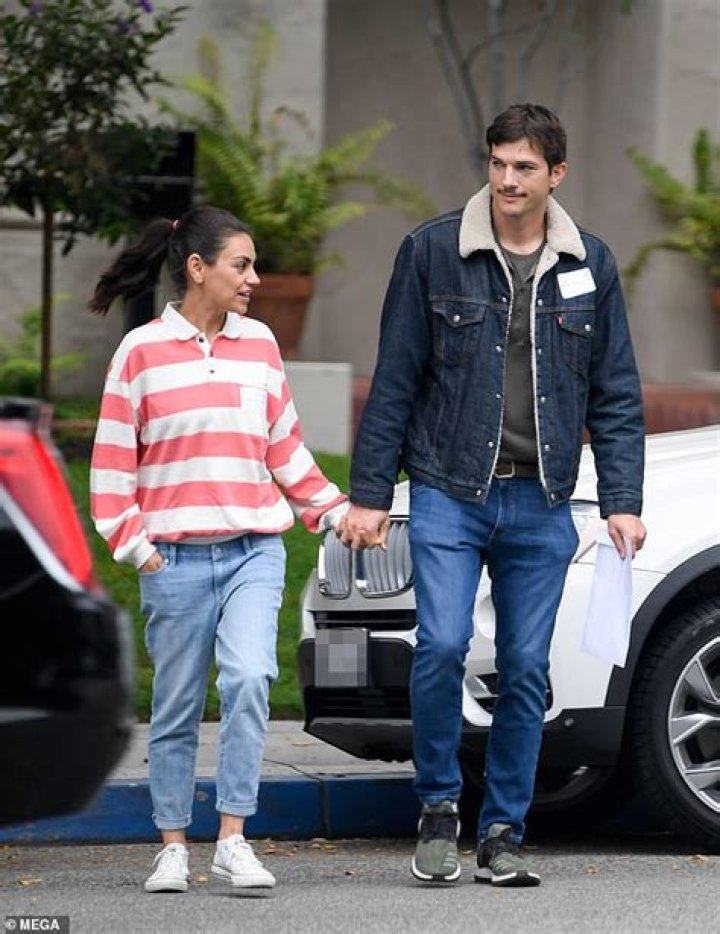Mila Kunis enjoys a casual stroll with husband Ashton Kutcher in LA