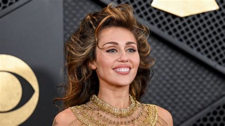 Miley Cyrus wore a bold, strapless twopiece. A BikiniClad Miley