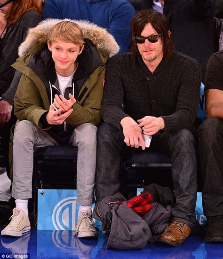 Norman Reedus kicks back at basketball game with son Mingus Daily