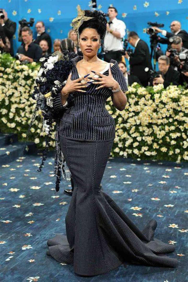 Of the Fashion... Nicki Minaj channels Miss Argentina from Beetlejuice