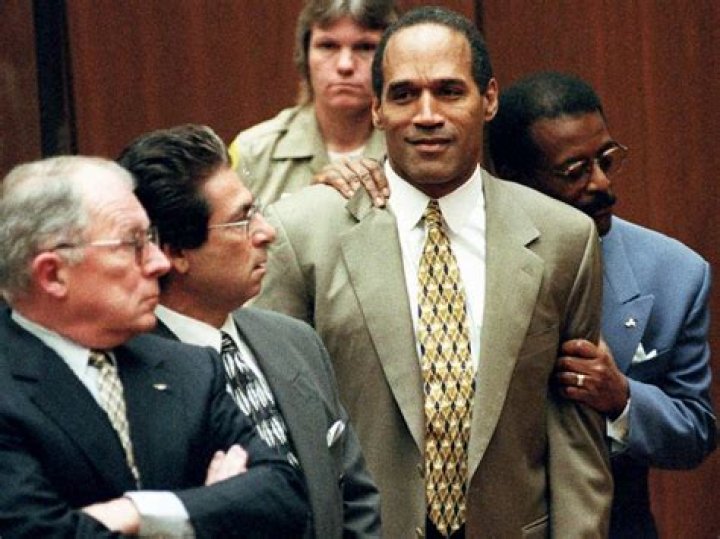 O.J. Simpson after his acquittal, with his son Jason on the left and