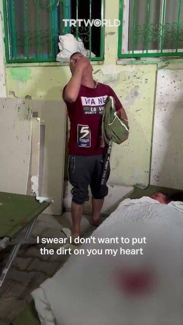 Palestinian Father Bids Farewell to His Daughter, Embracing Her in a