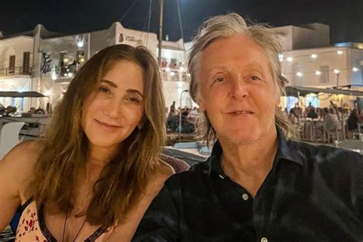 Paul and (most) of his girls. I can only guess that the three yougest