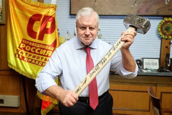 Russian politician poses with sledgehammer in tribute to Wagner