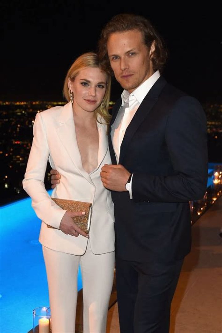 Sam Heughan & Girlfriend MacKenzie Mauzy Make Public Debut at Oscars