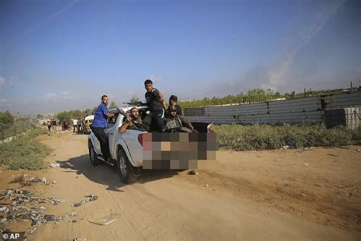 Shani Louk paraded by hamas militants in gaza in a truck Shani Louk