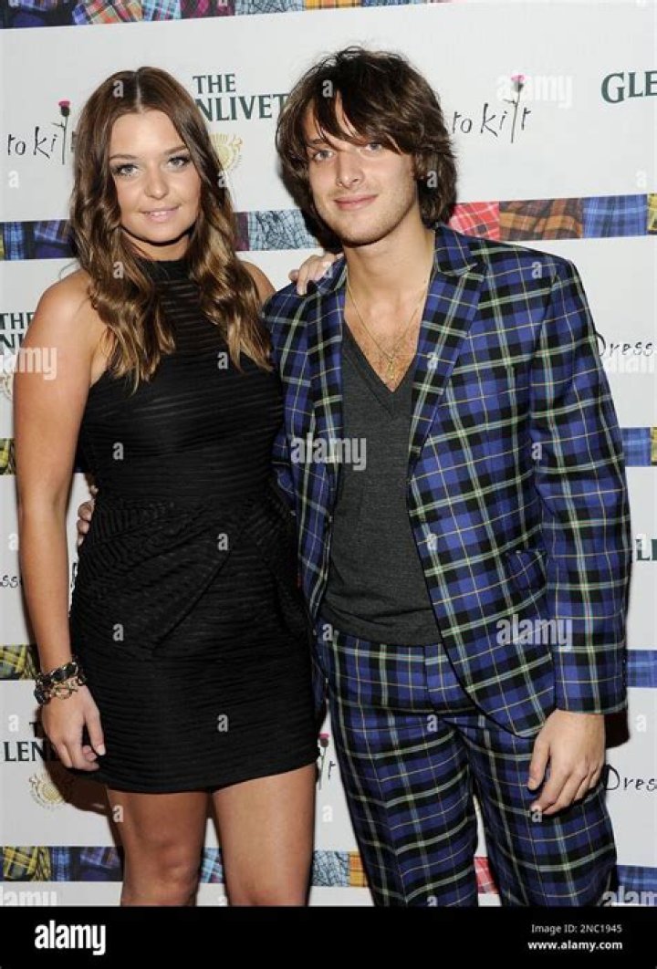 Singer Paolo Nutini and girlfriend Teri Brogan attend the