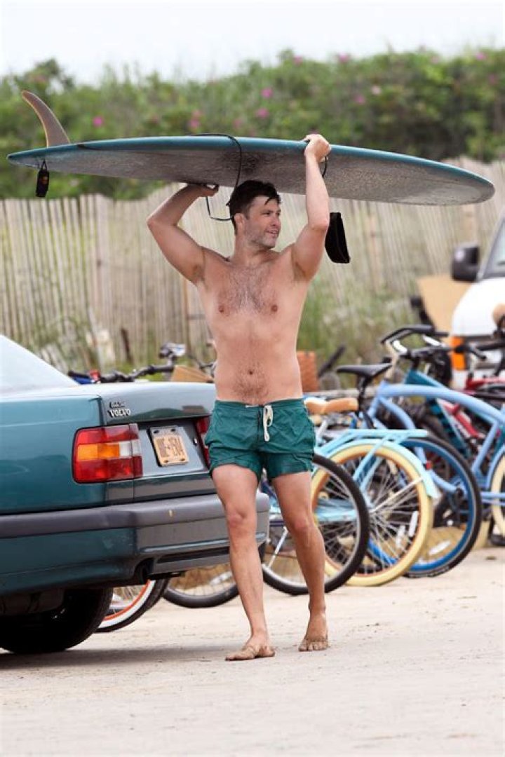 SNL Star Colin Jost Surfs in the Hamptons, Plus Lady Gaga, Kate Upton