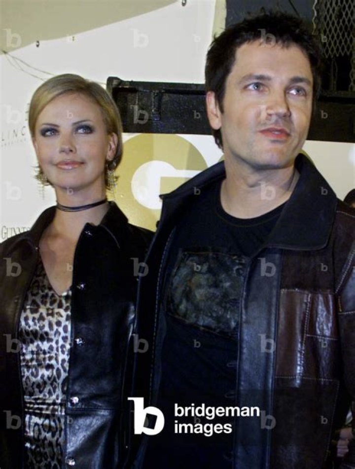 Stephan Jenkins and Charlize Theron during 1999 VH1/Vogue Fashion
