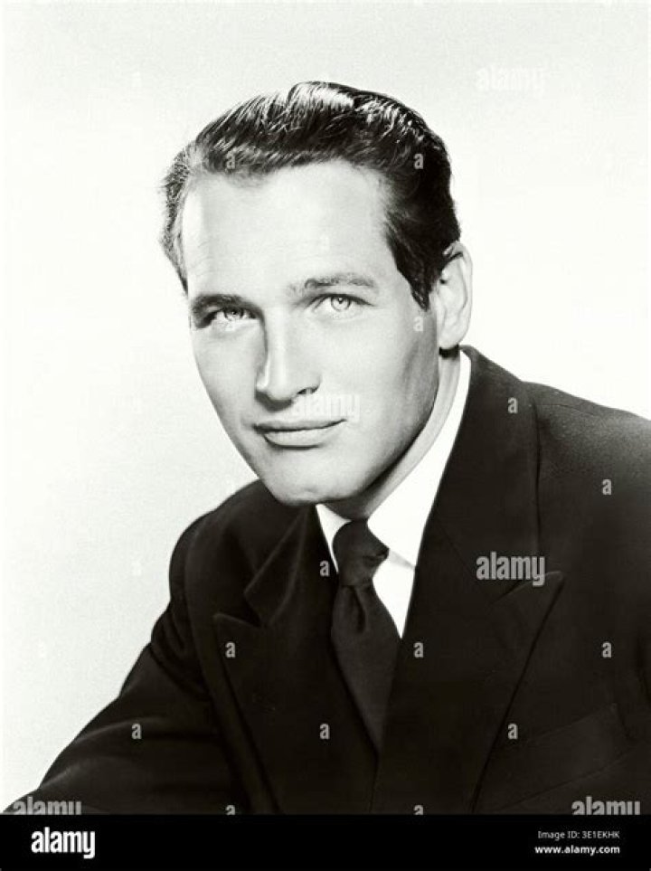 Studio portrait of American actor Warren Beatty wearing a cardigan