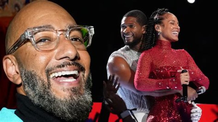 Swizz Beatz reacts to Usher hugging wife Alicia Keys from behind during