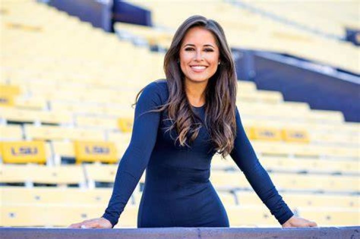 Taking the field Kaylee Hartung is getting the scoop for ESPN inRegister