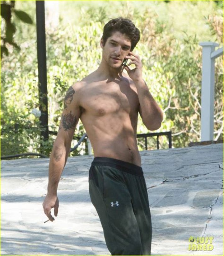 Tyler Posey Goes Shirtless as He Works on His Motorcycle! Photo