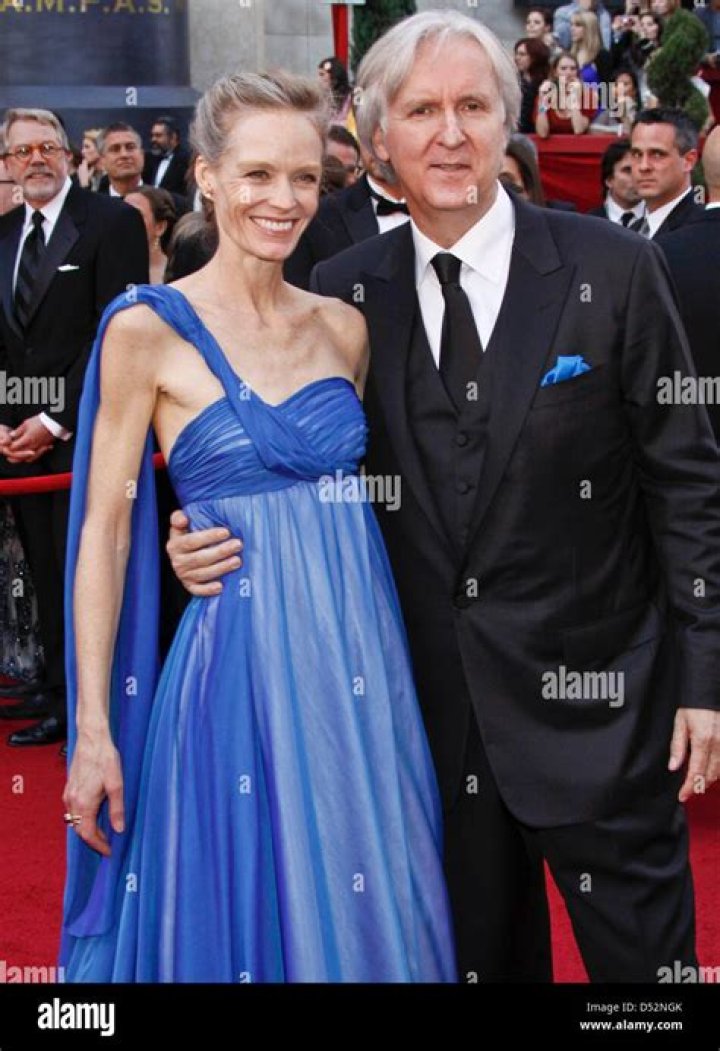 US director James Cameron and his wife Suzy Amis arrive on the red