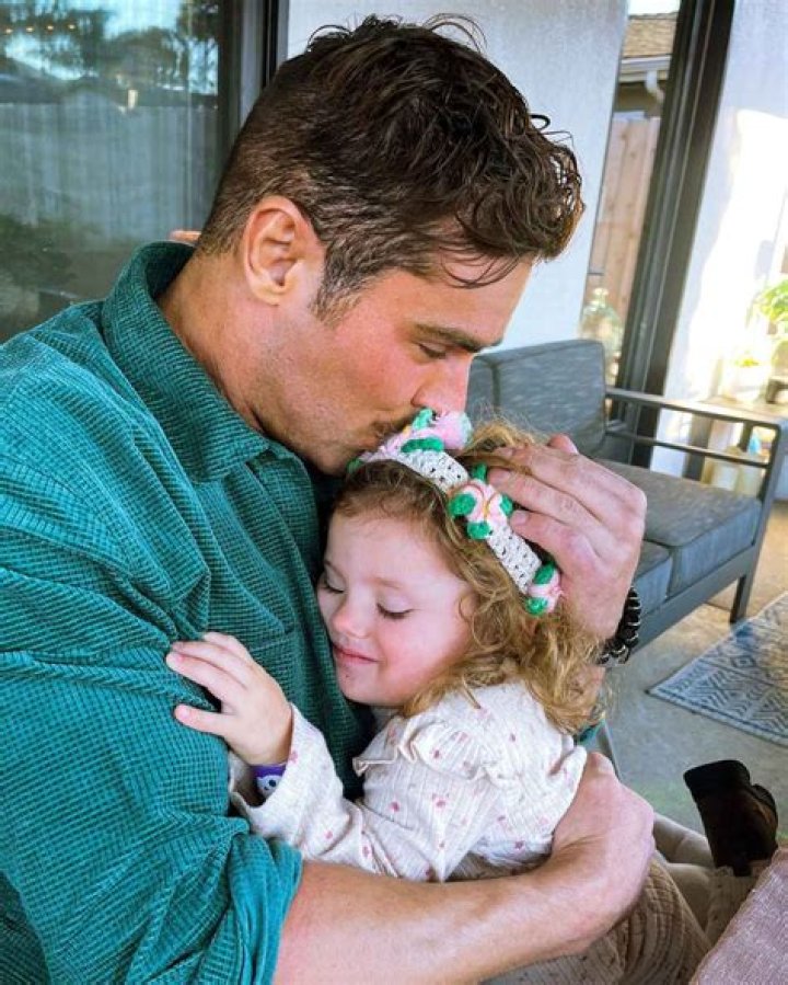 Zac Efron Cuddles Up With Baby Sister Olivia on Her Birthday Photo